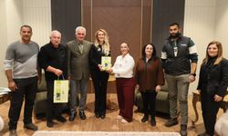 Nilden  Erhürman, Kalkanlı Anıt Zeytin Ağaçları Koruma Birliği Başkanı ve yönetim kurulu üyeleri ile bir araya geldi